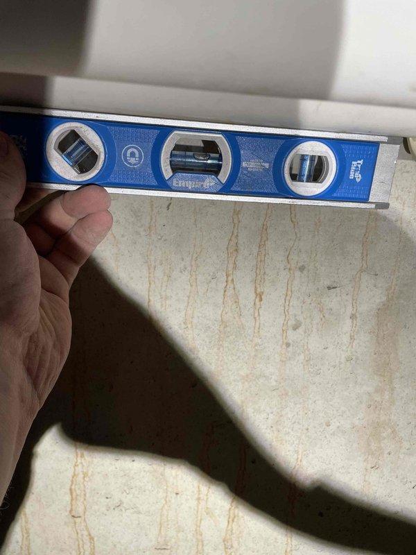 Diagnosed and repaired 5-year-old furnace with no heat issue caused by broken J hook on exhaust pipe. Removed condensation from exhaust line, corrected pitch with proper leveling, and installed two new J hooks to provide adequate support for the exhaust system.
