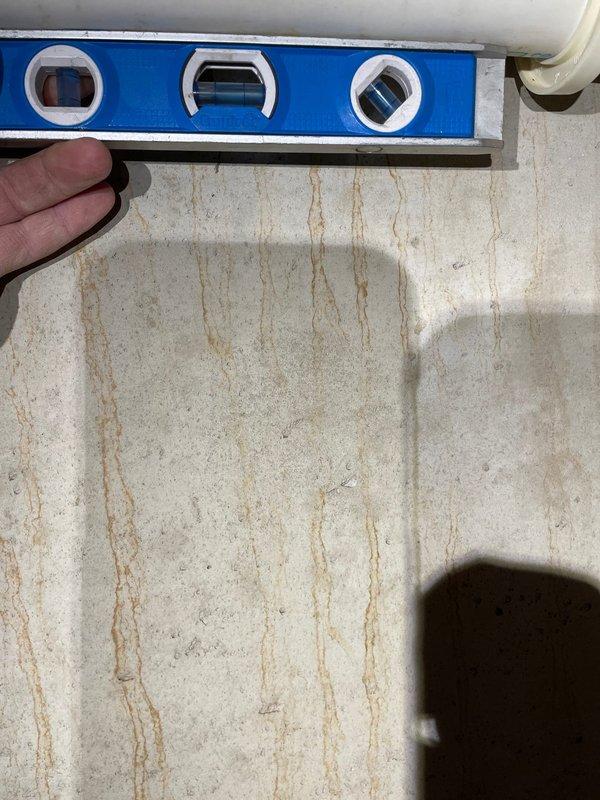 Diagnosed and repaired 5-year-old furnace with no heat issue caused by broken J hook on exhaust pipe. Removed condensation from exhaust line, corrected pitch with proper leveling, and installed two new J hooks to provide adequate support for the exhaust system.