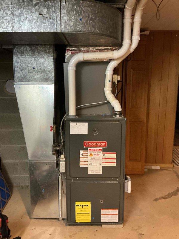 Performed annual preventative maintenance on Goodman furnace per prepaid agreement. Inspected blower assembly and confirmed proper operation of the motor and fan. System is operating within normal parameters with no issues identified in the furnace unit or connected ductwork.