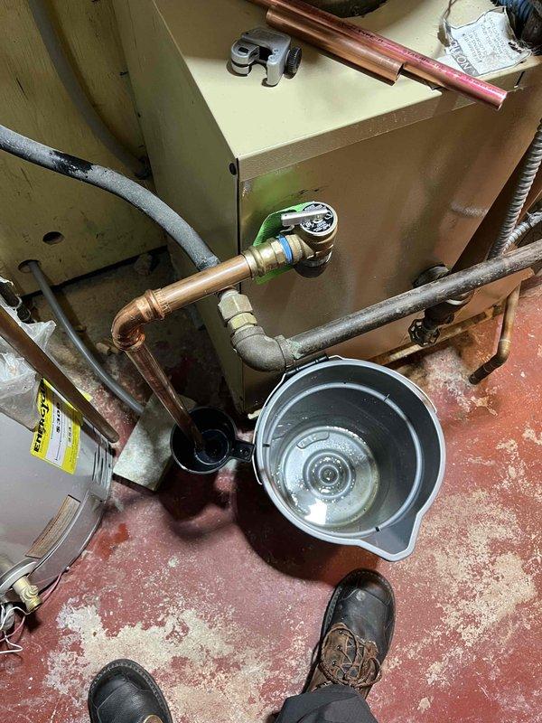 Responded to customer callback regarding boiler pressure and leakage concerns. Diagnostic assessment revealed pressure gauge reading incorrectly (showing 70 PSI when actual pressure was 35 PSI). Identified malfunctioning fill valve/backflow assembly, faulty relief valve, and inaccurate pressure gauge. Completed replacement of all three components to restore proper system function and pressure regulation.