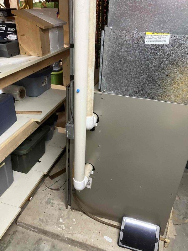 Diagnosed 20-year-old heating system with poor heat output, finding a compromised heat exchanger causing insufficient heat delivery. System was operating but unable to reach setpoint temperature (59°F actual vs 70°F setpoint). Recommended replacement of heat exchanger or full system replacement due to equipment age and safety concerns.