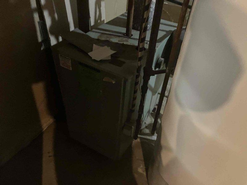 Performed annual inspection on 48-year-old boiler that customer reported was making gurgling noises and had not been serviced for an extended period. Diagnostic testing revealed carbon monoxide leakage from the unit, with visual confirmation of improper flame color. Recommended immediate consultation with comfort advisor due to safety concerns and age of equipment.