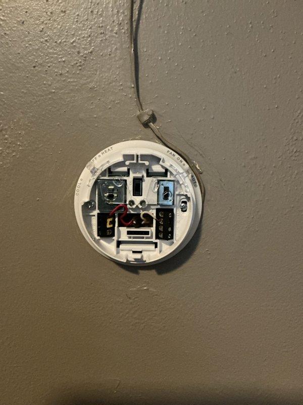 Successfully replaced customer's thermostat with a new Honeywell T87 manual model. Removed old unit, connected existing wiring to new thermostat terminals, and mounted securely to wall. Performed operational testing to verify proper heating and cooling functionality.