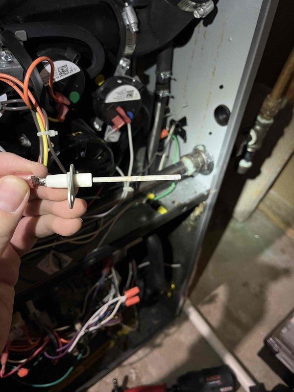 Performed annual inspection on 5-year-old furnace under Partner Plan. Identified multiple issues including scummed humidifier, flame sensor with dead spots, and aged components. Replaced ignition electrode and verified proper thermostat wiring connections for future Wi-Fi thermostat installation. Provided preventative maintenance recommendations to customer.