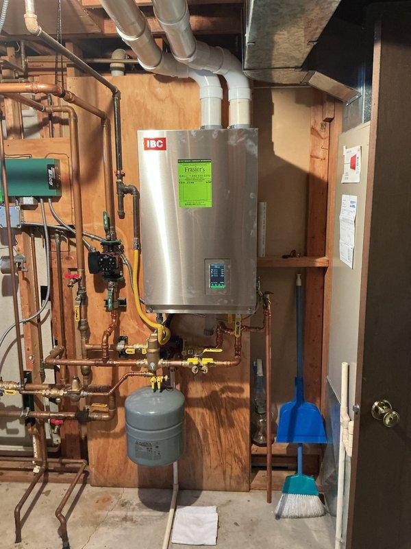 Responded to no-heat service call for recently installed boiler system. Diagnostic revealed control panel blackout following power outage. Restored system functionality by performing power cycle on display screen, successfully reestablishing heat and hot water production. System now operating normally with all components verified functional.