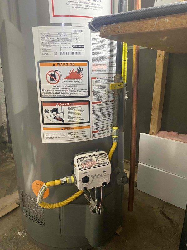 Responded to emergency gas leak detection near water heater installation. Identified failing ball valve between gas supply and water heater unit. Shut off gas supply for safety and replaced defective gas cock with new components including 1/2" gas line, properly sealed with teflon tape to ensure secure connection. System was tested for leaks after repair and confirmed safe for operation.