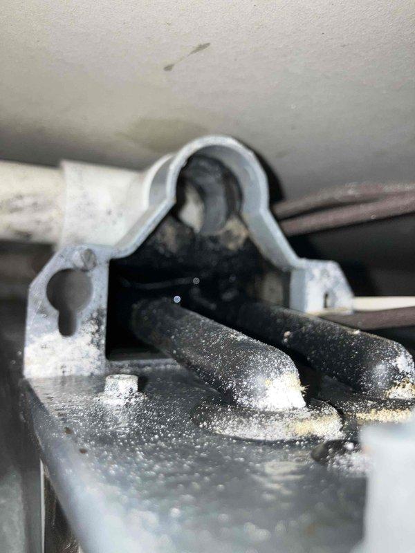 Responded to no heat complaint on 10+ year old furnace system. Diagnostic inspection revealed sooted heat exchanger with significant corrosion around ventilation components. Service performed included thorough cleaning of heat exchanger, replacement of compromised venting system, and installation of new inducer motor assembly to restore proper system operation.