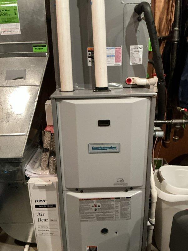 Performed annual preventative maintenance service on Comfortmaker furnace. Inspected complete system including intake/exhaust PVC piping, drain lines, and Trion Air Bear filtration system. All components verified to be in proper working order with no issues detected.