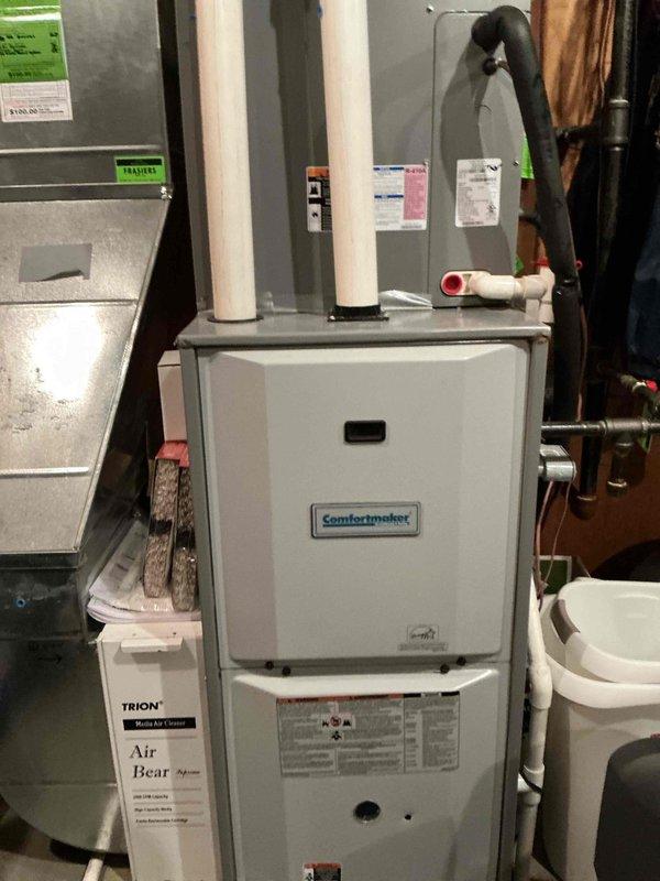 Performed annual preventative maintenance service on Comfortmaker furnace. Inspected complete system including intake/exhaust PVC piping, drain lines, and Trion Air Bear filtration system. All components verified to be in proper working order with no issues detected.