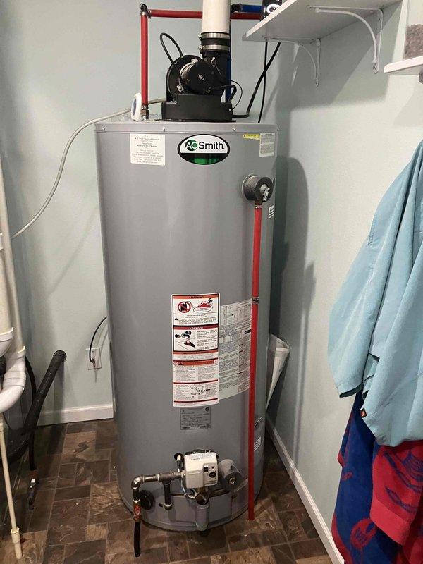 Responded to service call for intermittent heating issue with Carrier furnace. Diagnostic assessment revealed code errors and improper operation parameters. Performed system adjustment including gas pressure calibration and airflow optimization to restore proper furnace operation. Additionally serviced A.O. Smith water heater by resetting gas valve to restore hot water functionality.