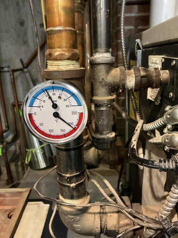 Responded to emergency no-heat call for relatively new Munchkin boiler system. Diagnosed boiler shutdown due to high temperature limit being triggered by a failing circulation pump. Replaced defective pump to restore proper water flow, which resolved the high temperature limit issue and restored normal heating operation.