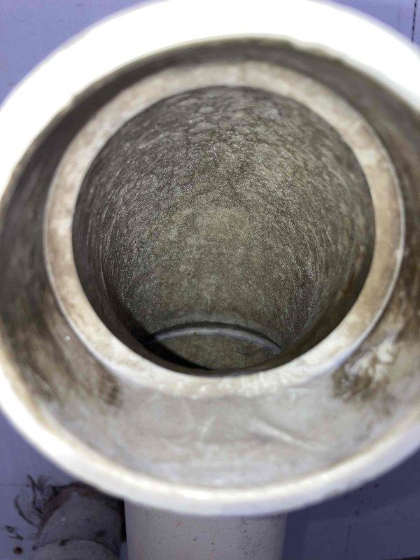 Responded to no-heat service call for furnace displaying error code 33 (3 short, 3 long). Diagnostic inspection revealed failed heat exchanger with visible damage confirmed through visual inspection. Recommended complete heat exchanger replacement or full furnace replacement due to the severity of the failure.