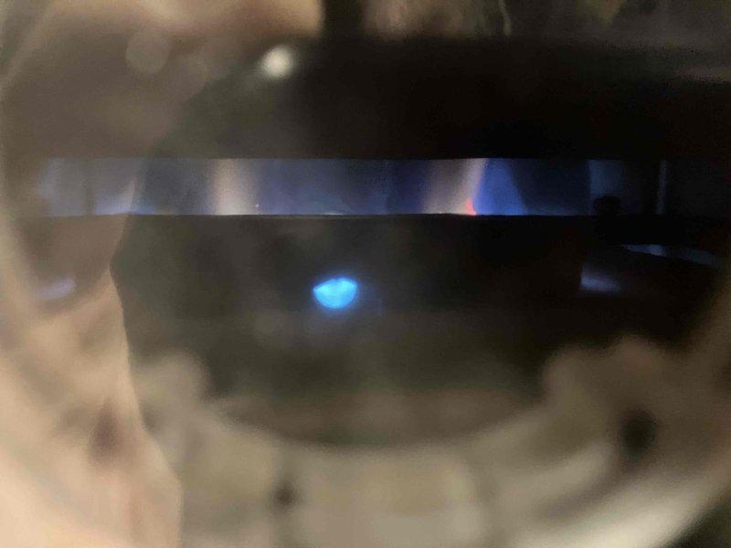 Responded to no-heat service call for furnace displaying error code 33 (3 short, 3 long). Diagnostic inspection revealed failed heat exchanger with visible damage confirmed through visual inspection. Recommended complete heat exchanger replacement or full furnace replacement due to the severity of the failure.