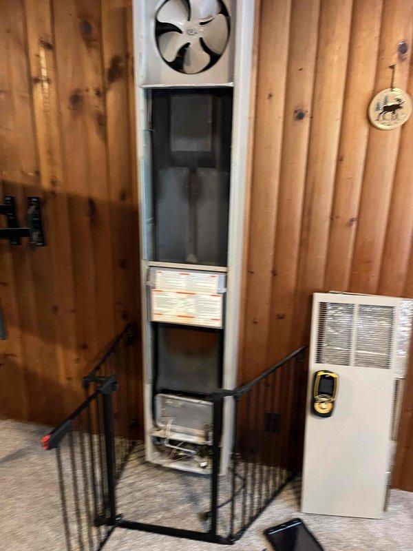 Performed annual inspection on older LP wall furnace in a home built in the 1960s. Identified broken sight glass gasket and corrosion on the ignition assembly. Inspected and verified fan operation as part of the tune-up service. Provided customer with estimates for necessary repairs.