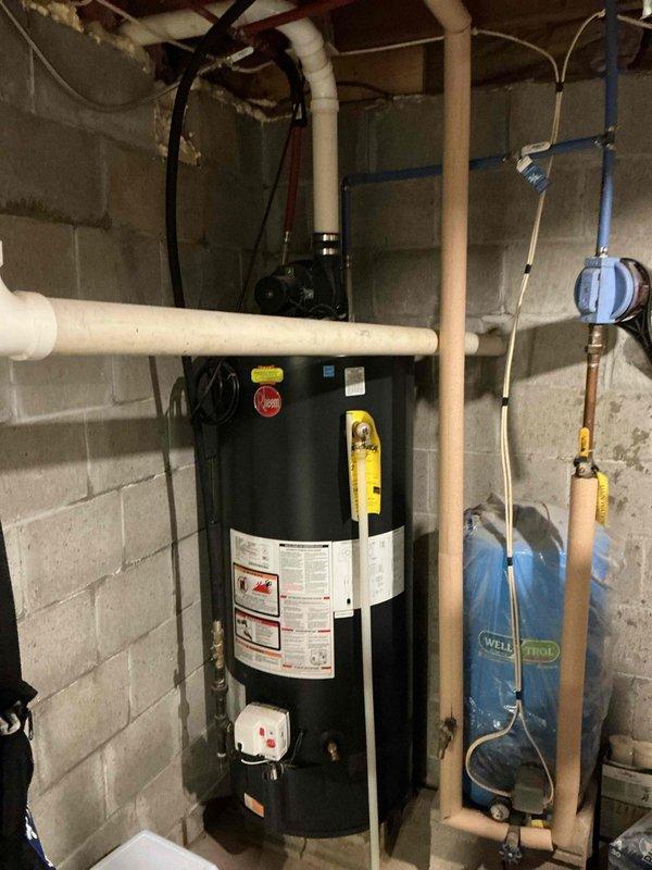 Performed annual preventative maintenance on 1996 furnace per prepaid service agreement. Accessed property using provided key code. Observed water heater and associated plumbing systems in basement utility area during inspection. Replaced air filter and reviewed recommended replacement intervals with customer via phone.