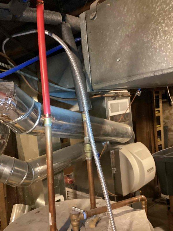 Performed site assessment for gas line modifications, including evaluation of existing line for stove and potential split for fireplace installation. Inspected HVAC mechanical room setup including copper piping, flexible ducting, and humidifier connection points. Provided customer with detailed estimates for running new gas lines to accommodate requested appliance connections.
