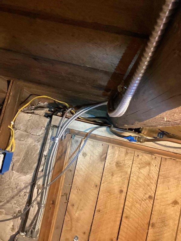 Performed site assessment for gas line modifications, including evaluation of existing line for stove and potential split for fireplace installation. Inspected HVAC mechanical room setup including copper piping, flexible ducting, and humidifier connection points. Provided customer with detailed estimates for running new gas lines to accommodate requested appliance connections.