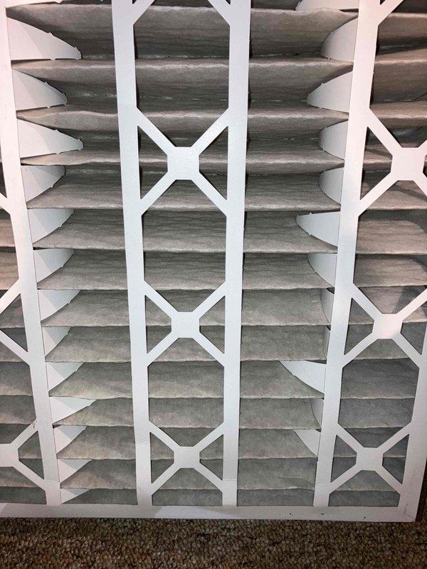 Performed annual prepaid maintenance service on furnace. Inspected system and identified heavily soiled air filter with significant dust accumulation. Removed and replaced filter to improve system efficiency and airflow. Ventilation components appear functional after service.