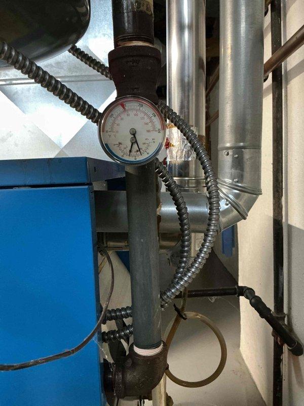 Performed annual Partner Plan heat inspection on natural gas boiler. Conducted comprehensive preventative maintenance and identified faulty pressure gauge requiring replacement. System otherwise operational with normal wear; recommended replacement of pressure gauge to maintain proper system monitoring.
