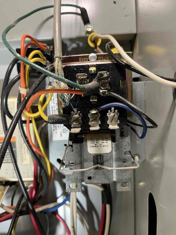Performed annual furnace inspection at residence (code 1395/129). Inspected electrical components including relay/contactor assembly and wiring connections. Noted homeowner-installed LUX digital thermostat functioning properly (70.4°F, 53% humidity). Recommended furnace replacement due to observed system age and condition.