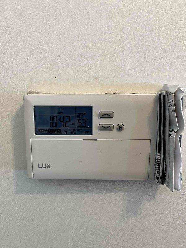 Performed annual furnace inspection at residence (code 1395/129). Inspected electrical components including relay/contactor assembly and wiring connections. Noted homeowner-installed LUX digital thermostat functioning properly (70.4°F, 53% humidity). Recommended furnace replacement due to observed system age and condition.