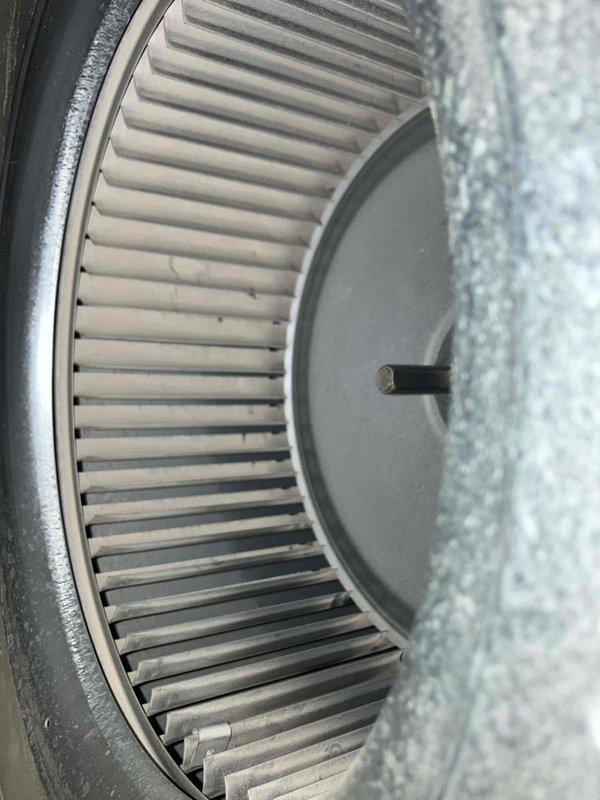 Performed annual preventive maintenance inspection on 20-year-old furnace. Conducted combustion analysis with readings showing O2 at 8.0%, CO at 9P, and CO2 at 7.4%. Inspected blower wheel assembly which showed normal dust accumulation consistent with age of unit.