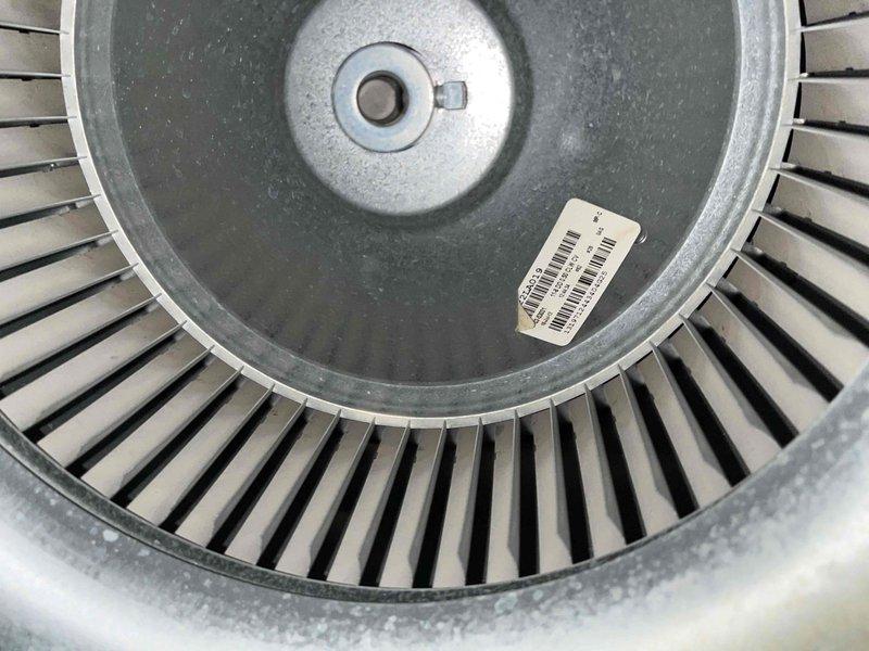 Performed annual preventative maintenance on residential furnace. Inspected blower wheel assembly which showed normal wear with minimal dust accumulation. Recommended replacement of existing air filter to maintain optimal system performance and efficiency.