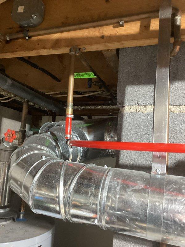 Responded to no heat complaint in a zoned hydronic heating system. Diagnosed air lock in the system and multiple leaking zone valves. Purged air from the system, replaced faulty zone valves, rebuilt water distribution components, and installed new drain valve on the 6-9 year old boiler to restore proper heating function to all zones.