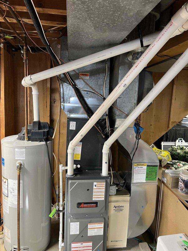 Performed annual prepaid maintenance on Amana furnace system. Identified aged UV bulb, flame sensor degradation, and humidifier leak during inspection. Cleaned humidifier drain pan and provided customer with repair options; will assess proper placement of Honeywell humidifier system.