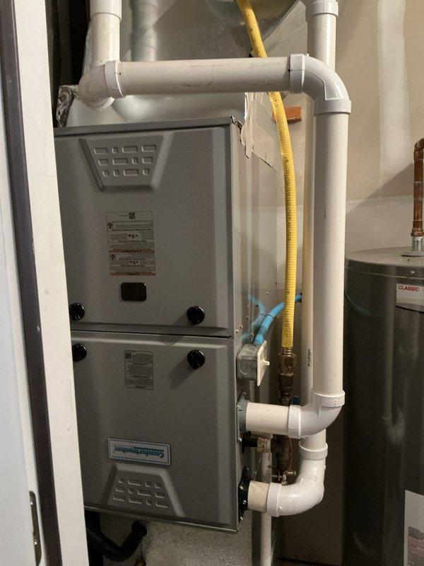 Responded to no heat call where customer reported bad odor from furnace. Upon inspection, found Comfortmaker furnace (10+ years old) operating correctly with no detectable odors at the unit. Performed diagnostic testing and cleaning of system components. Advised customer that reported smell may be external to HVAC system and recommended discussing with neighbors if odor issues persist.