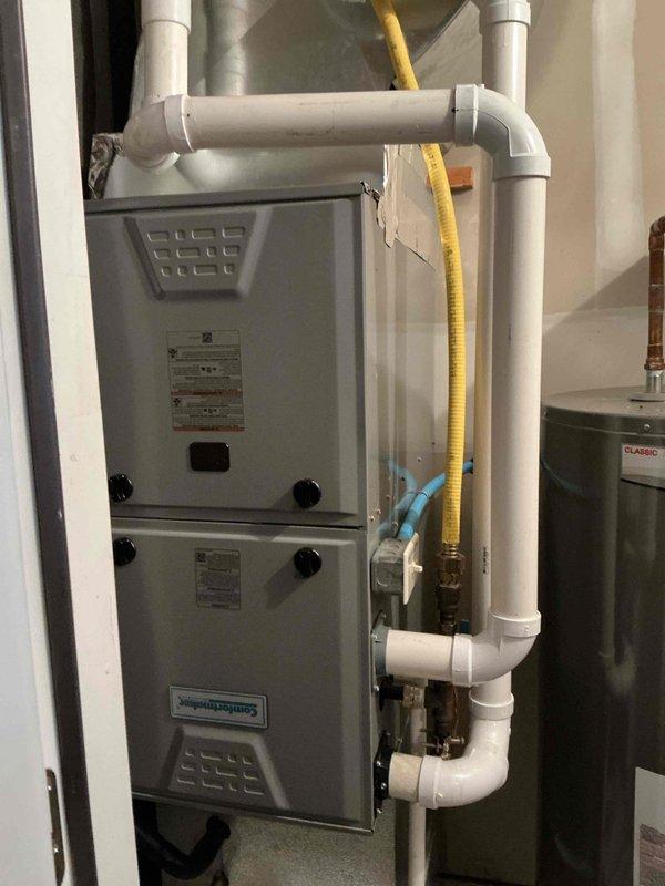 Responded to no heat call where customer reported bad odor from furnace. Upon inspection, found Comfortmaker furnace (10+ years old) operating correctly with no detectable odors at the unit. Performed diagnostic testing and cleaning of system components. Advised customer that reported smell may be external to HVAC system and recommended discussing with neighbors if odor issues persist.