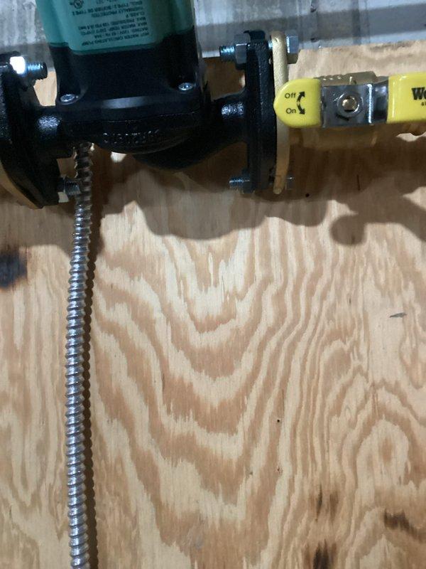Responded to recall for leaking boiler. Identified improperly seated flange on pump causing water leakage. Corrected flange position and secured connection. System now operational without leaks. Will return to add antifreeze to complete service.