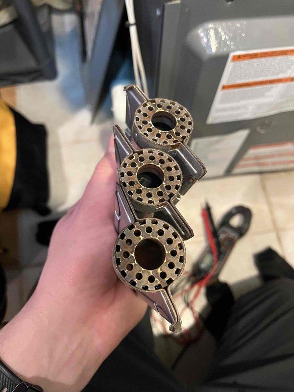 Performed annual heat inspection under Partner Plan maintenance agreement. Identified high resistance on flame sensor, corrosion affecting burners and igniter, and significant dust accumulation in ductwork. Cleaned accessible components and provided customer with remediation options for remaining issues.