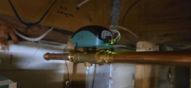 Diagnosed and resolved loud banging noise in Zone 3 heating system. Inspection revealed failing valve actuator causing significant rattling during system cycling. Replaced defective valve actuator to restore proper operation of boiler heating zone controls.
