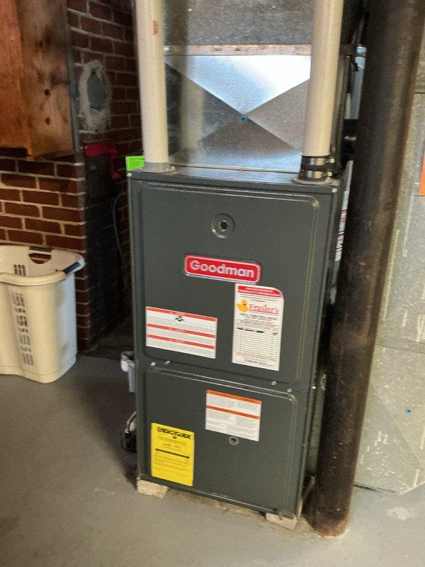 Responded to no heat call for 16-year-old natural gas Goodman furnace that would ignite but immediately shut down. Diagnosed E2 error code indicating a system fault. Inspected unit, verified proper venting through PVC intake and exhaust pipes, and checked all connections. Performed necessary repairs to restore heating function and reviewed system operation with customer.