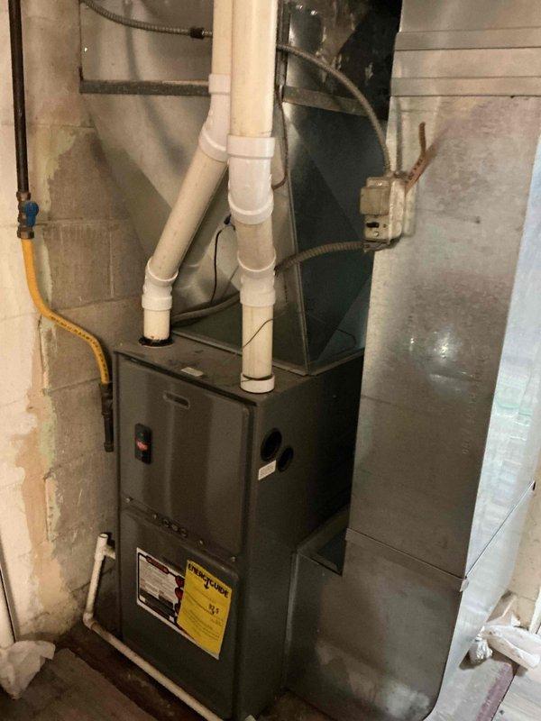 Responded to service call for 7-year-old furnace with no heat operation. Diagnostic testing revealed failed pressure switch preventing ignition sequence. Removed defective component and installed new pressure switch, restoring proper furnace operation and heat to the residence.