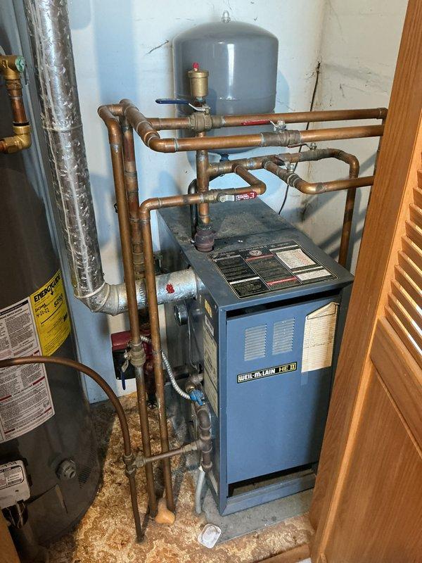Responded to no heat service call for a Weil-McLain HE II boiler system. Previously diagnosed faulty Aquastat requiring replacement; upon return visit, discovered incorrect part had been shipped. Contacted manufacturer to order correct Aquastat and will return to complete installation along with scheduled pump, expansion tank, and air vent replacement.