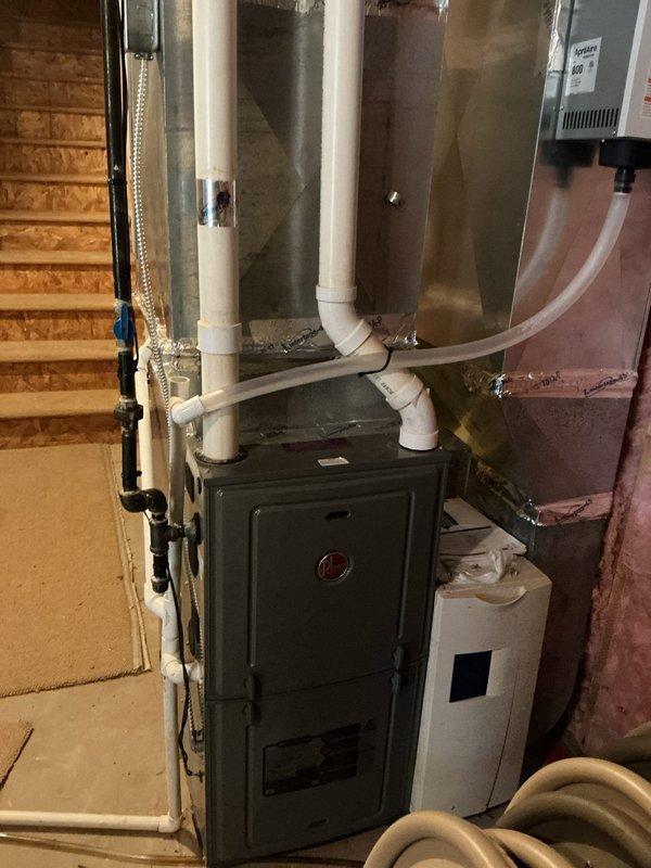 Responded to customer complaint of loud squealing noise from 20-year-old furnace. Conducted diagnostic inspection of residential HVAC system located in basement utility area. Identified and serviced the aging furnace unit, addressing the noise issue to ensure proper operation during cold weather conditions.