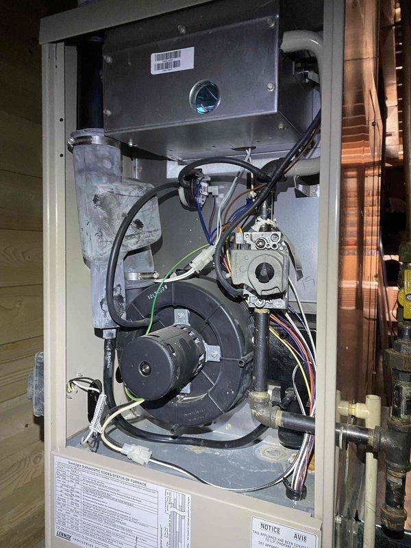 Responded to no heat complaint for 22-year-old residential furnace system. Diagnostic inspection revealed low batteries in Nest thermostat causing communication failure with heating equipment. Replaced batteries and verified proper system operation, restoring heat function. Recommended replacement of aging thermostat to prevent future failures.