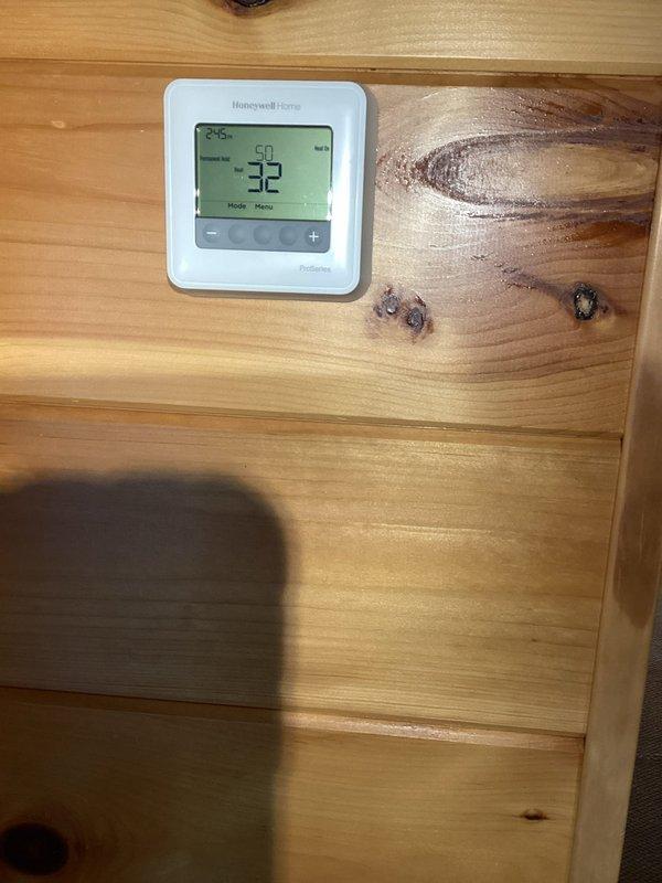 Responded to emergency no-heat call for 3-year-old boiler system showing ignition lockout failure. Diagnostic testing confirmed combustion issues related to frozen LP regulator. Restored heat functionality with thermostat now reading 52°F, up from critical low of 32°F.