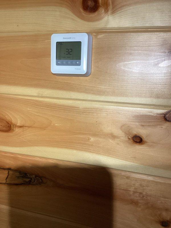 Responded to emergency no-heat call for 3-year-old boiler system showing ignition lockout failure. Diagnostic testing confirmed combustion issues related to frozen LP regulator. Restored heat functionality with thermostat now reading 52°F, up from critical low of 32°F.