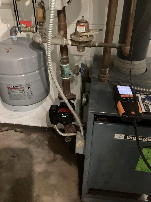 Responded to emergency no-heat call for a 10+ year-old Weil-McLain boiler system. Diagnosed failed circulation pump as primary issue. Replaced defective circulation pump and installed new expansion tank to restore proper system operation and heat to residence.