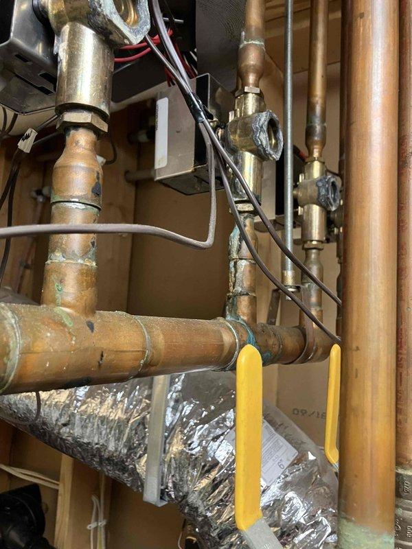 Diagnosed faulty zone valve head and replaced both valve head and body after initial replacement of head alone failed to resolve the issue. Completed comprehensive testing of the system to verify proper operation of the newly installed zone valve components (ERIAG13A02A). Customer approved escalated repair scope.