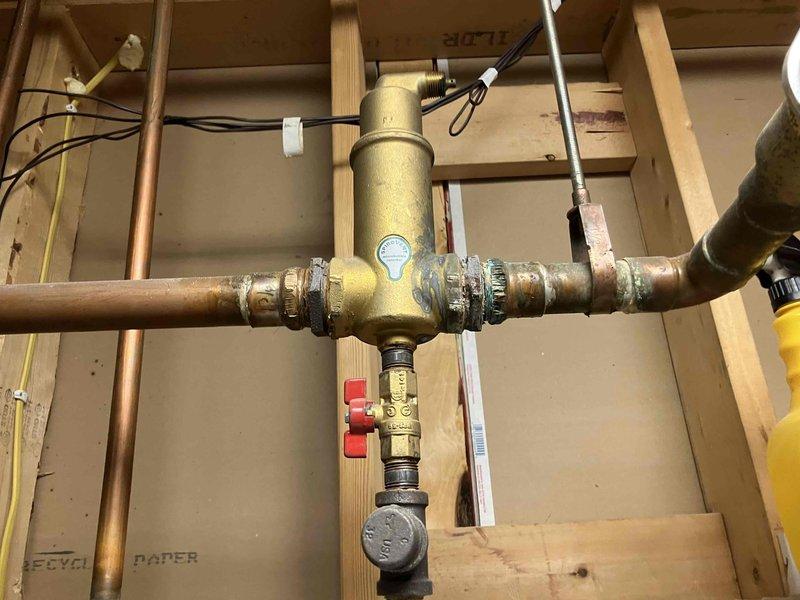 Diagnosed faulty zone valve head and replaced both valve head and body after initial replacement of head alone failed to resolve the issue. Completed comprehensive testing of the system to verify proper operation of the newly installed zone valve components (ERIAG13A02A). Customer approved escalated repair scope.