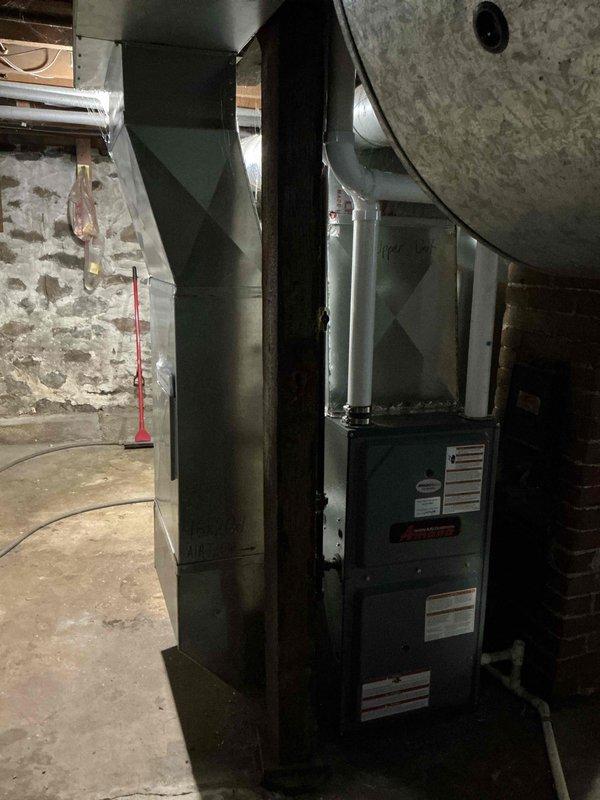 Performed preventative maintenance on two 8-year-old furnaces that were not maintaining adequate heating capacity. Removed and inspected circular perforated components, likely filters or burner assemblies. Both units are operational but require regular maintenance to improve performance and efficiency.