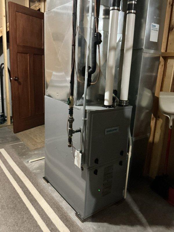 Responded to service call for intermittent heating issue on 7-year-old natural gas furnace. Upon arrival, unit was operational with green indicator light illuminated. Performed comprehensive inspection of furnace components and found system functioning normally at time of service. Explained proper operation and preventative maintenance options to customer to help prevent future intermittent operation.