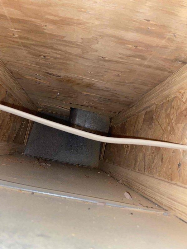 Completed duct cleaning service addressing significant dust accumulation and debris in the trunk lines and return duct. Inspection revealed wooden duct surfaces with visible water damage and discoloration on the upper surfaces. Thoroughly cleaned all accessible trunk lines, removing built-up dust and contaminants to improve system efficiency and air quality.