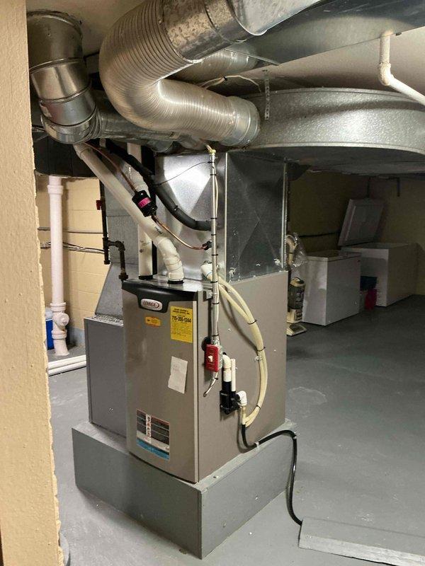 Responded to service call for 10+ year old furnace displaying error codes E227 and E229, which had gone into lockout mode. Diagnostic inspection revealed faulty pressure switch causing system failure. Replaced defective pressure switch and reset system, restoring normal furnace operation. Advised customer to contact son with any follow-up questions regarding pressure switch functionality.