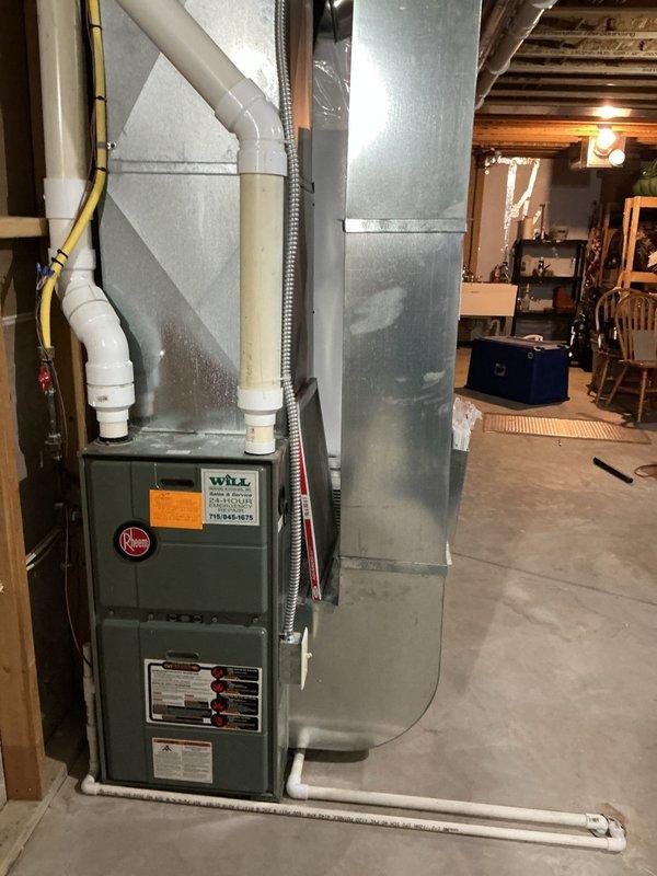 Diagnosed and resolved heating issue on 15-year-old Rheem furnace that was shutting down after reaching 65 degrees. Inspection of internal components revealed a failed pressure switch, which was replaced to restore proper system operation and heat function.