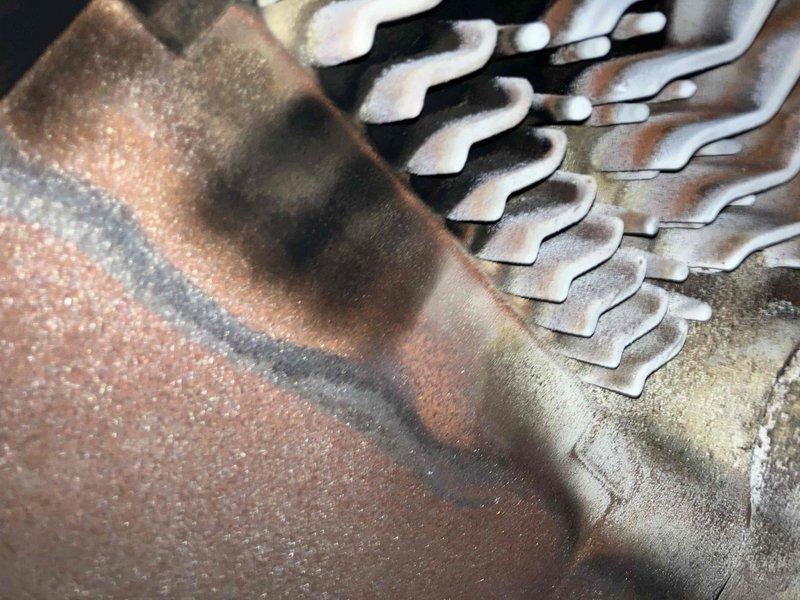 Responded to no-heat call where boiler failed to ignite. Diagnosed shorted flame rod causing system lockout. Discovered incorrect assembly had been installed with incompatible fittings. Replaced with proper assembly, restoring normal ignition and heating function. Visual inspection of heat exchanger revealed significant dust accumulation and possible oxidation on evaporator coil fins.